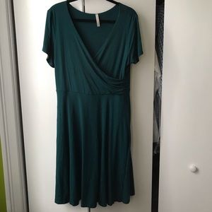 Teal faux wrap knee length dress